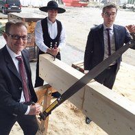 Implenia holds topping-out ceremony at “sue&til”